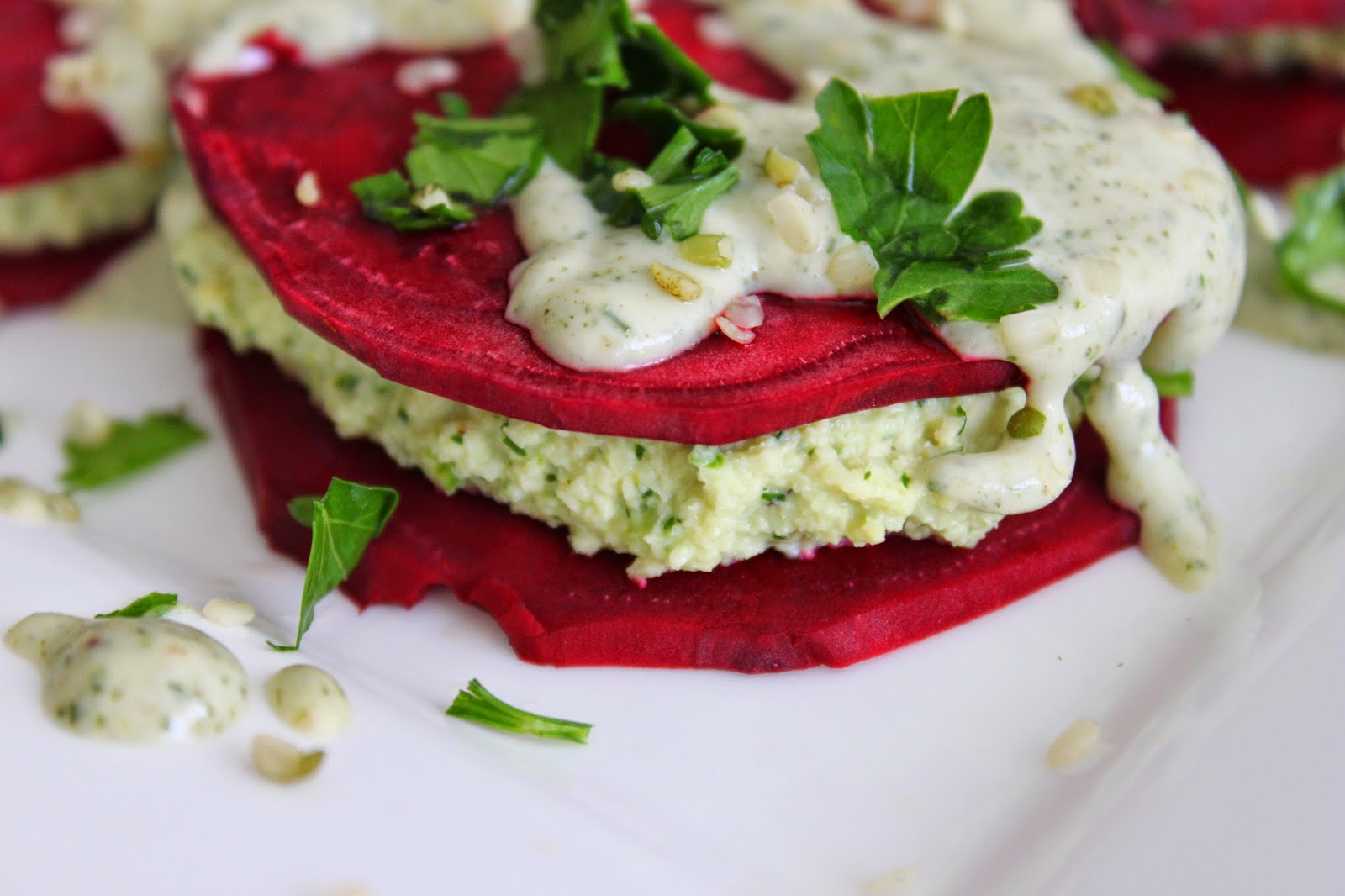 Raw Beet Ravioli with Macadamia nut cheese and hemp drizzle Raw Beet Ravioli with Macadamia nut cheese and hemp drizzle